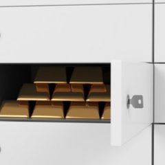 White safe deposit boxes in a bank. There are gold bullions inside of a one box. A concept of storing of important documents or valuables in a safe and secure environment. 3D rendering.