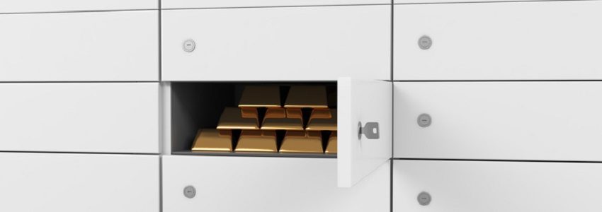White safe deposit boxes in a bank. There are gold bullions inside of a one box. A concept of storing of important documents or valuables in a safe and secure environment. 3D rendering.